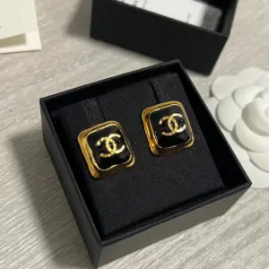 Chanel black gold candy earring