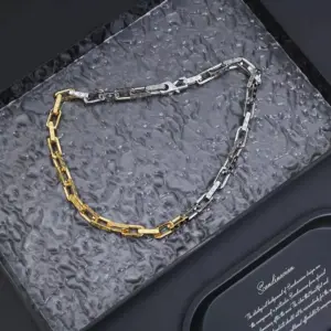 Monogram chain charm bracelet with metallic sheen