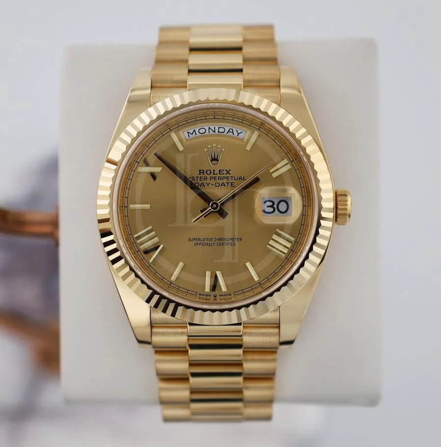 Rolex Day-Date 40 Yellow Gold Champagne Roman Dial & Fluted Bezel President Bracelet 228238 –