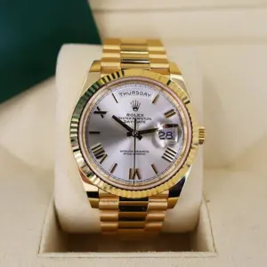Rolex Day-Date 40 Yellow Gold Silver Roman Dial & Fluted Bezel President Bracelet 228238 –