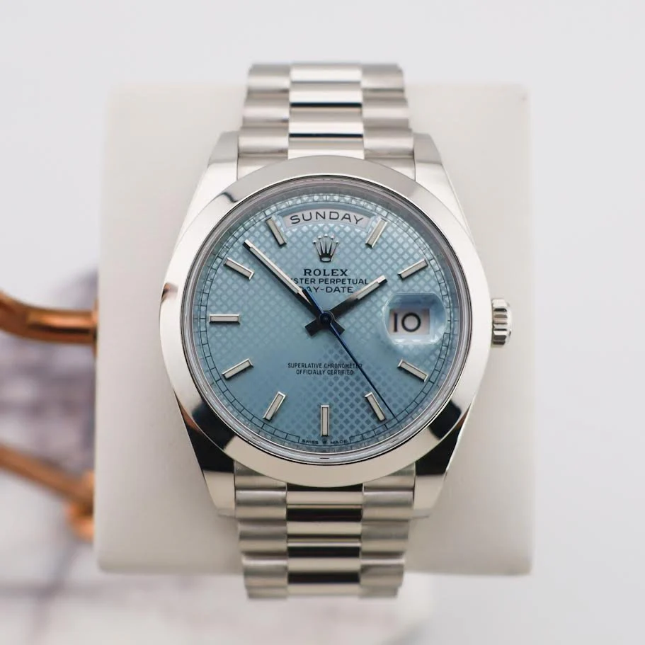 Rolex Day-Date 40 Platinum Ice Blue Diagonal Motif Dial & Smooth Bezel President Bracelet 228206 –