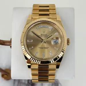 Rolex Day-Date 40 Yellow Gold Champagne Diamond Dial & Fluted Bezel President Bracelet 228238 –