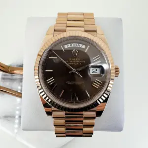 Rolex Day-Date 40 Rose Gold Chocolate Roman Dial & Fluted Bezel President Bracelet 228235 –