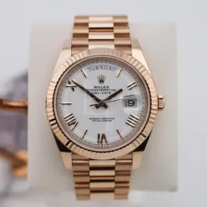 Rolex Day-Date 40 Rose Gold White Roman Dial & Fluted Bezel President Bracelet 228235 –