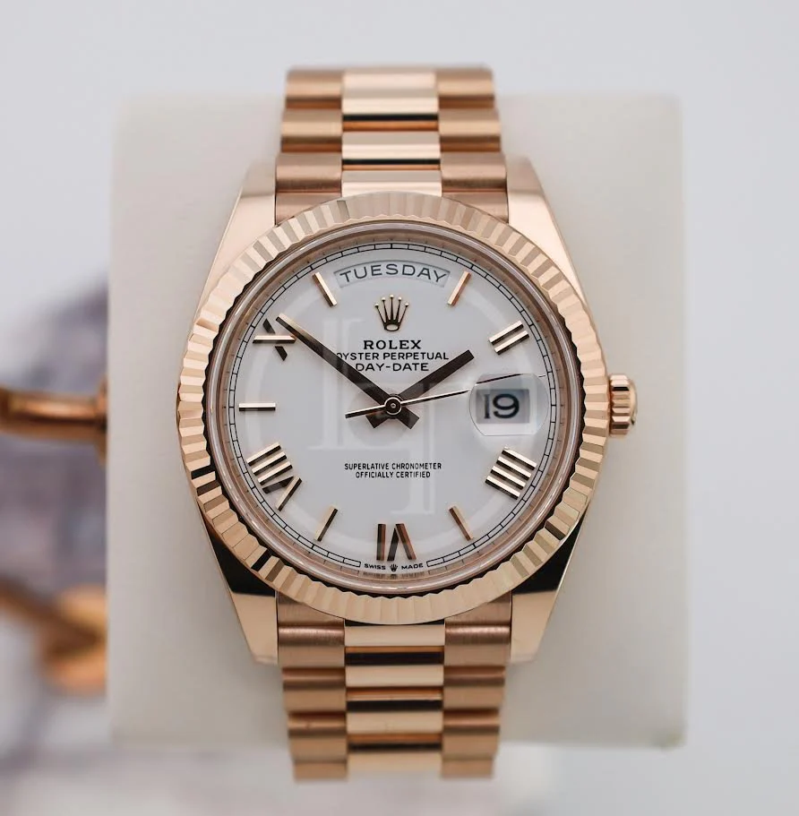 Rolex Day-Date 40 Rose Gold White Roman Dial & Fluted Bezel President Bracelet 228235 –