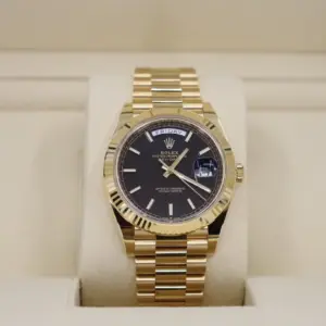Rolex Day-Date 40 Yellow Gold Black Diagonal Motif Index Dial & Fluted Bezel President Bracelet 228238 –