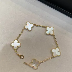 Five flower bracelet gold white mother-of-pearl