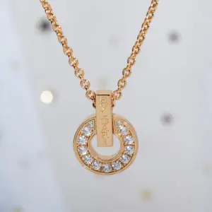 Bvlgari circular coin necklace with hollow design