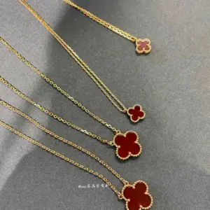 Mini red four-leaf earring