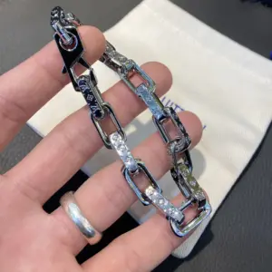 Monogram silver charm bracelet with titanium steel