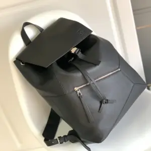 Puzzle backpack with soft grain imported calf leather