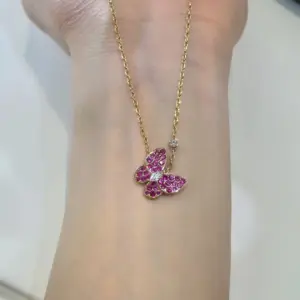 Mini butterfly necklace with pink sapphire