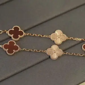 VCA red agate and laser-engraved clover five-fold bracelet
