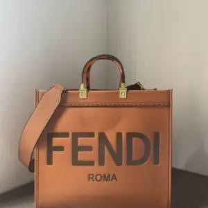 Fendi tote bag with resin handles and vintage aesthetic