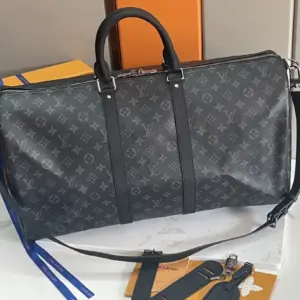 Keepall 55 Travel Bag with Monogram Eclipse Canvas