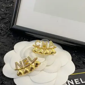 Chanel asymmetrical letter love earring