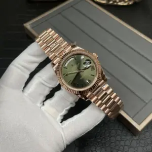 GM Rolex double date rose gold