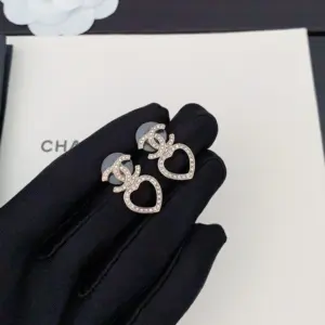 Chanel gold CC hollow heart earring