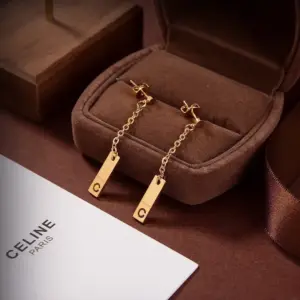 Celine carved art earring