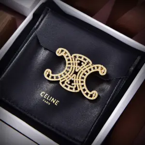 Celine lipstick door brooch