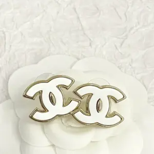 Chanel white enamel double c earring