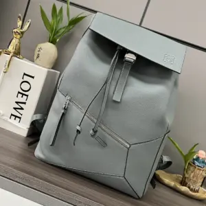 Puzzle backpack with small front pocket