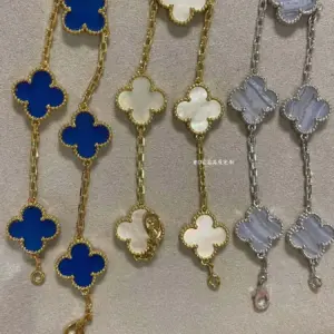 Blue, white and purple five-fold bracelet with clover pattern