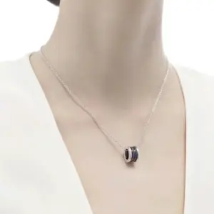 Small red person charity necklace