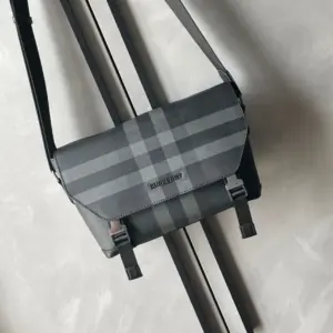 Latest messenger bag with charcoal checked pattern