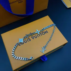 Louis Vuitton handchain with LV letters Monogram hook, fine polished metal chain, creative clasp detail