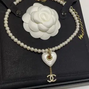Chanel 24P new hollow white heart full diamond double C pendant pearl necklace