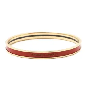 Narrow enamel bracelet with gold rim and red color numbered 0001553211
