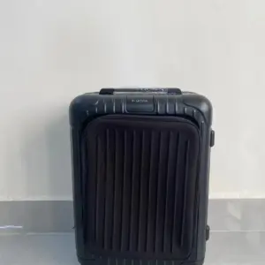 20 inch Rimowa grey black sleeve luggage