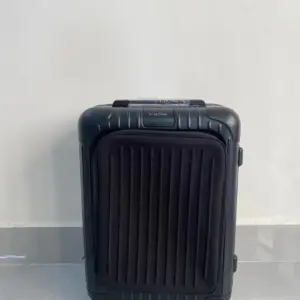 20 inch Rimowa grey black sleeve luggage