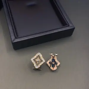 Black shell stud earrings