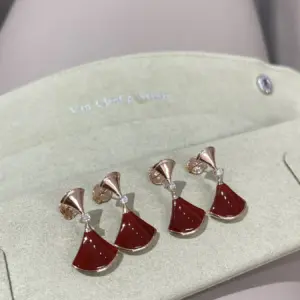 Single diamond red skirt earrings