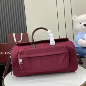 Medium GG travel bag red GG canvas