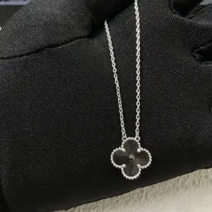 Cartier new black onyx white platinum four leaf necklace