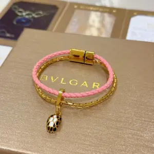 Serpenti double-layer bracelet in red and gold colors