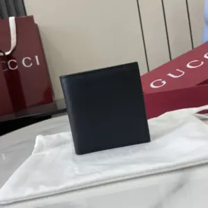 Black leather double-fold wallet with GG cross pattern