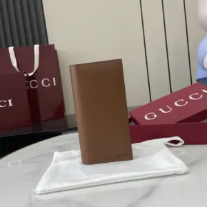 Brown leather long wallet with GG cross pattern