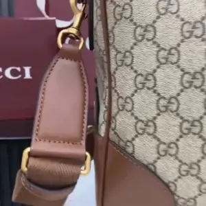 Medium Gucci Emblem travel bag