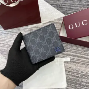 Men’s wallet with GG Supreme fabric and blue accents