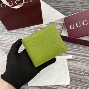 Green bifold wallet with Gucci logo